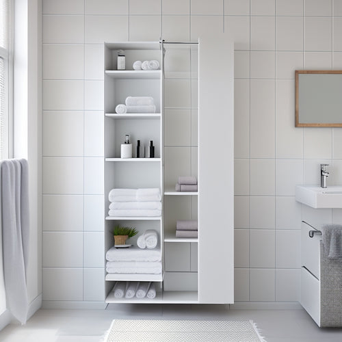 A sleek, modern bathroom with a wall-mounted, white, rectangular storage unit featuring three horizontal shelves, each holding a rolled towel, against a calming, light-gray background.