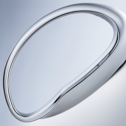 A close-up of a modern, sleek chrome shower faucet trim with an ADA-compliant handle, featuring a curved, ergonomic design and a subtle, satin finish, set against a clean, white background.